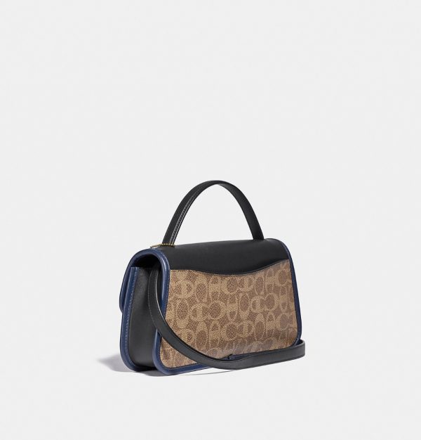 COACH x CHAMPION  |  Turnlock Clutch in Signature Canvas (TAN BLACK) - Image 3